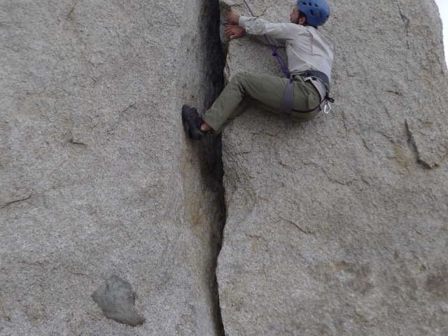 I climb the summit block as a lieback. Photo credit: Kurt the hermit