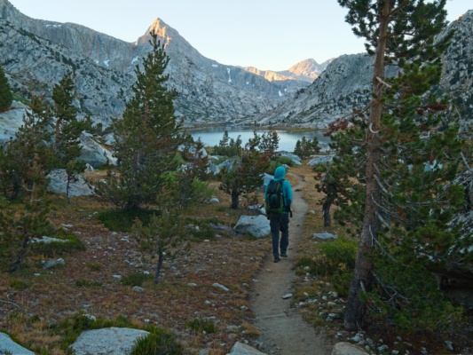 Craig hikes along Evolution Lake with Mount Spencer catching the morning light evolution lake