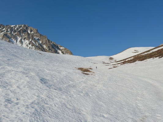 We skin up the snow, roughly following the summer trail kid mountain ski tour