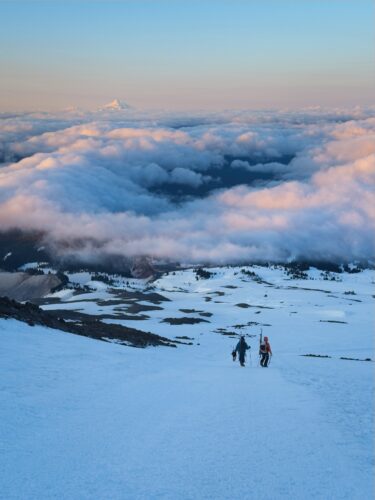 Dozens of people pass us hiking downhill, citing high winds and ice as their reason for turning around mount hood