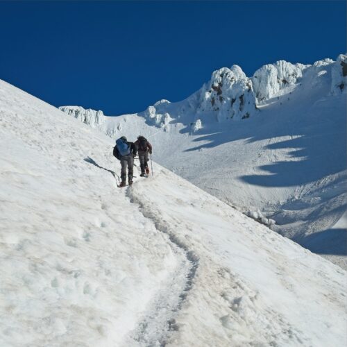 Josh and Jack hiking uphill from Devil's Kitchen toward Old Chute mount hood