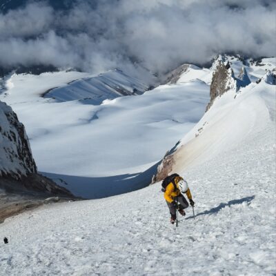 Jack hikes up the steep snow and ice mount hood