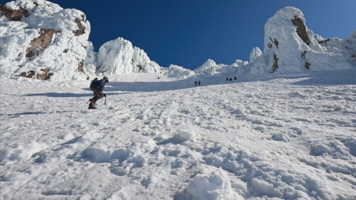 Climbers on their way up and down the Old Chute mount hood