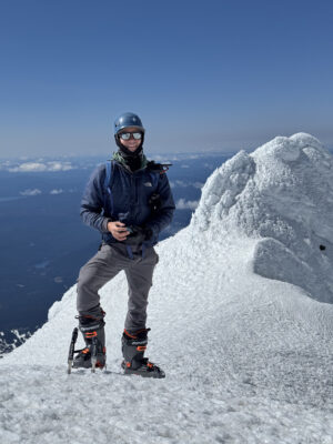 Josh near the summit while we wait for other climbers to descend mount hood