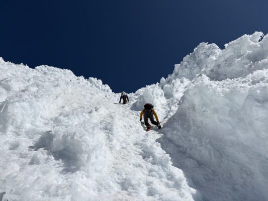 Jack and I slowly, carefully climb down the steep slope; photo credit: Josh mount hood