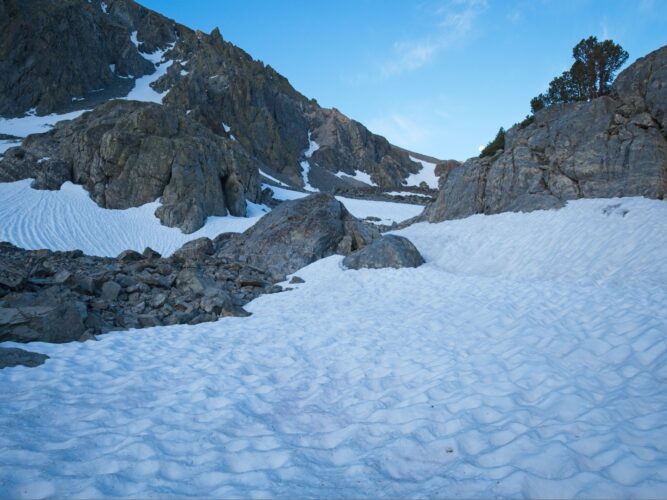 As I hike higher, I encounter more and more snow black diamond traverse