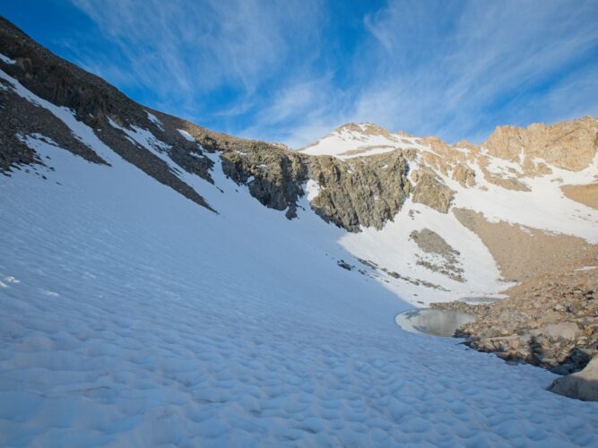 My route to Black Mountain is up the snow on the left to reach the valley above those cliffs black diamond traverse