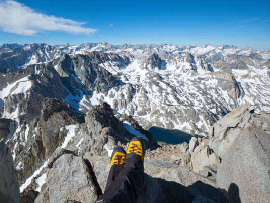 A view into the upper Rae Lakes Basin from Black Mountain; Painted Lady is the colorful rock formation on the left, with Dragon Lake in the foreground black diamond traverse