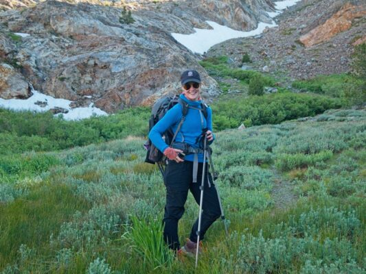 Shannon poses in front of the snow bloody canyon trail