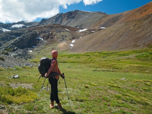 Shannon looks back at Koip Peak from the alpine meadows koip peak