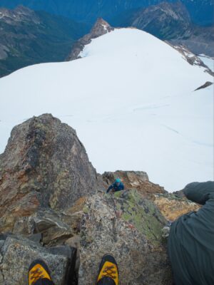 Craig climbs to the summit climbing