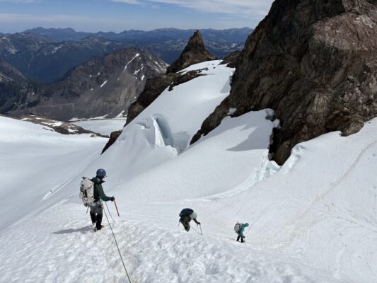 We hike down the steep snow slope; photo credit: Josh mountaineering