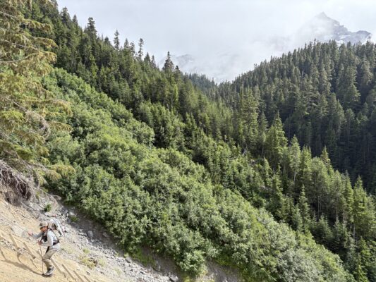 I pull myself up the slope by the ladder mountaineering