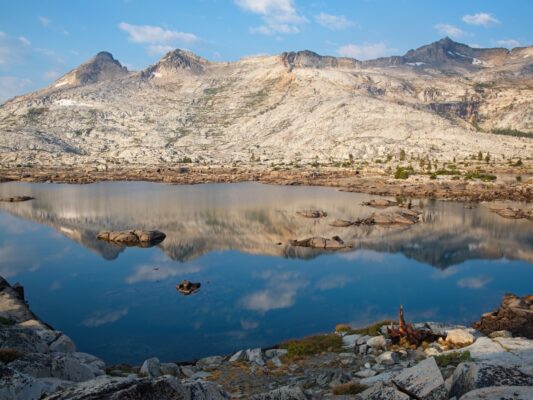 Morning light on Pyramid Peak and a glassy Lake Aloha tahoe rim trail