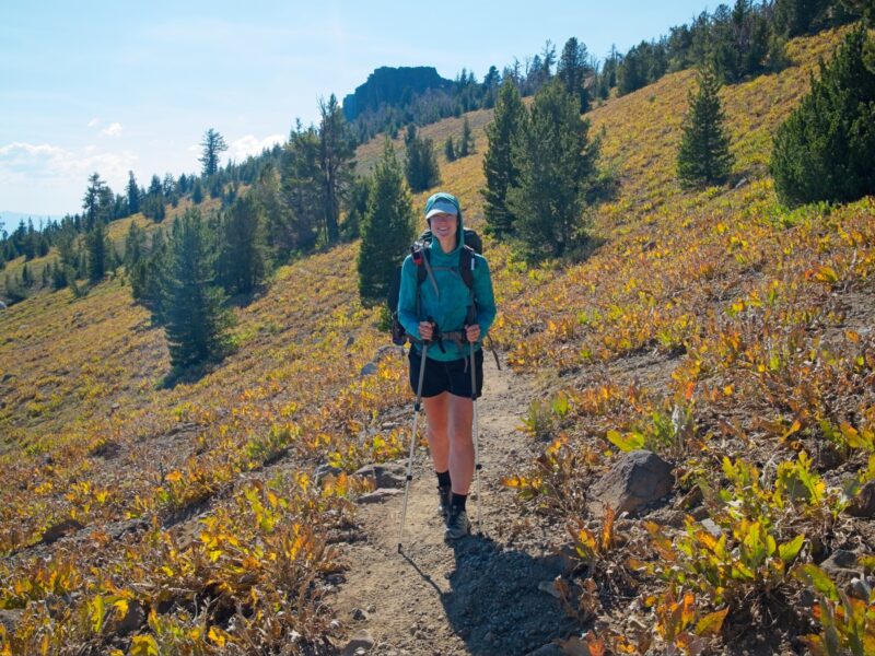 Shannon walks through a slope full of whisper weed tahoe rim trail