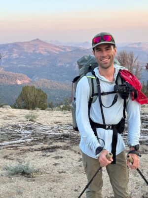 I pose in front of the sunset colors - photo credit: Shannon tahoe rim trail