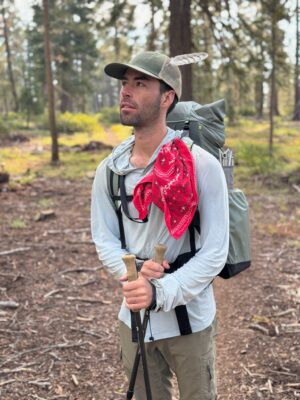 Yours truly sports a feather in his cap - photo credit: Shannon backpacking
