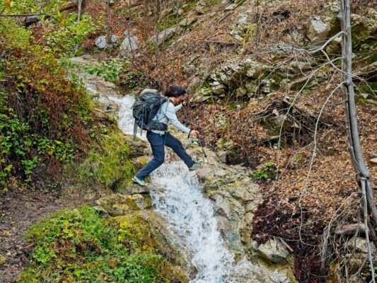 Shannon jumps over the water gabrielino trail