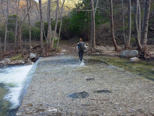 Shannon wades through another river crossing gabrielino trail
